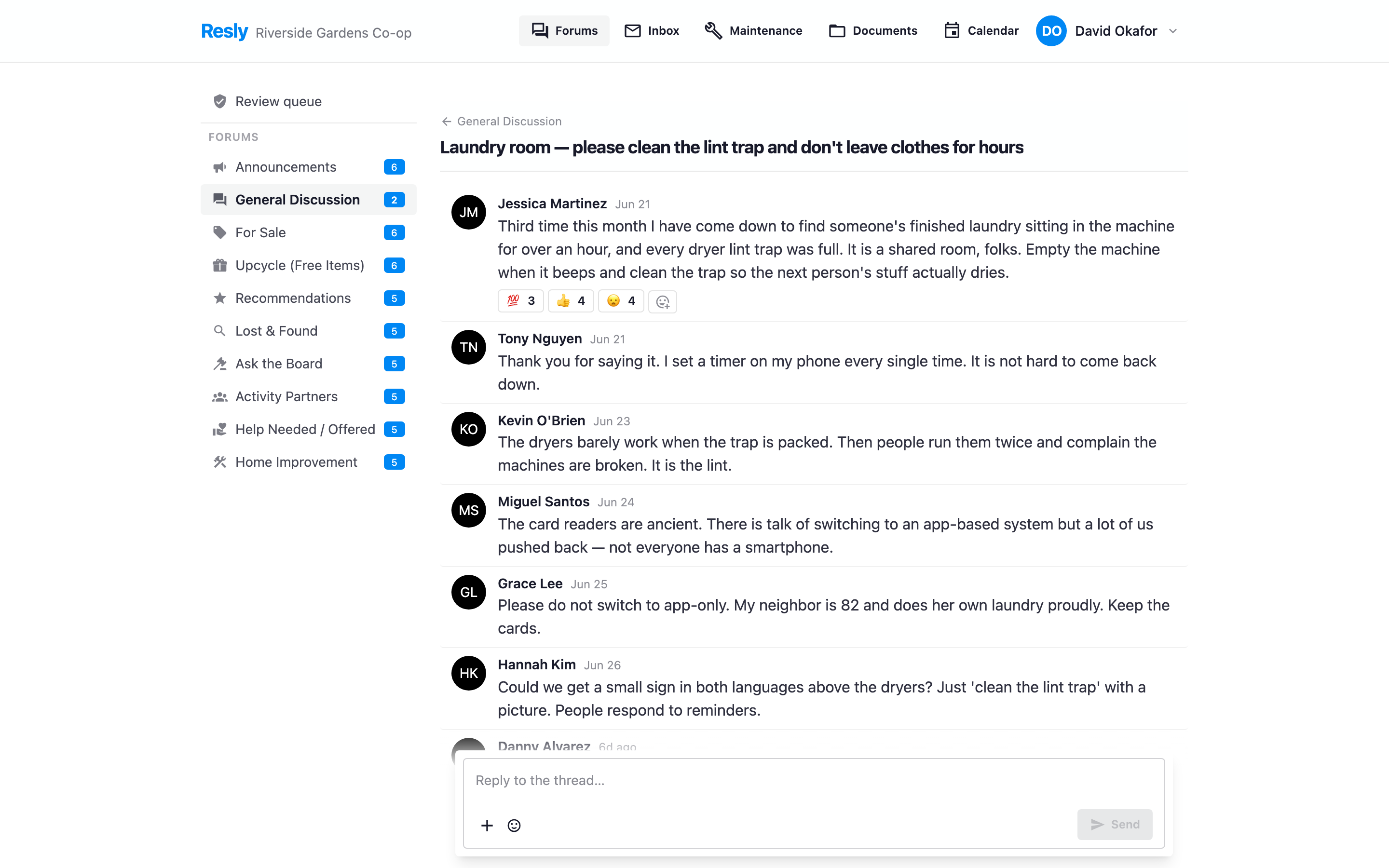 The Resly resident forum, showing building channels and a conversation thread